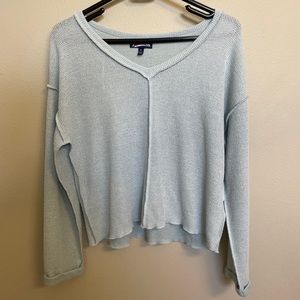 Small light blue sweater